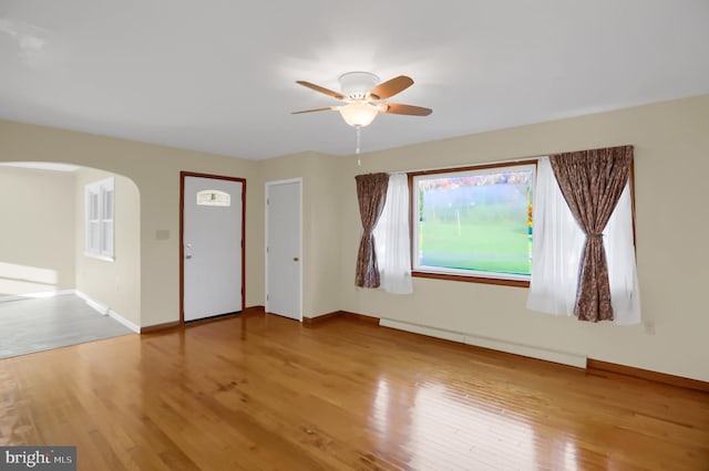 foyer entrance featuring light hardwood / wood-style flooring and ceiling fan