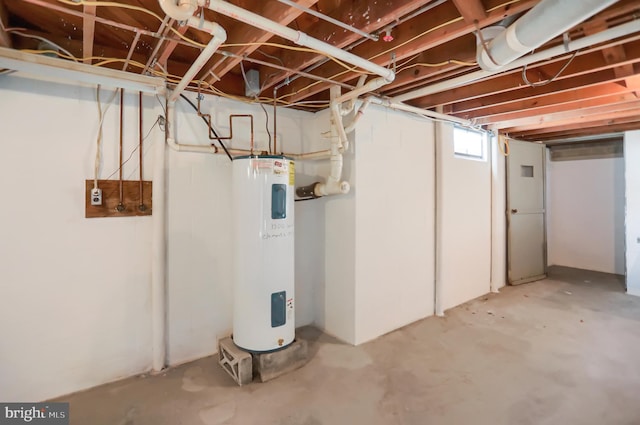 basement featuring electric water heater