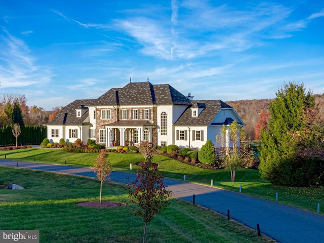 view of front of house with a front lawn