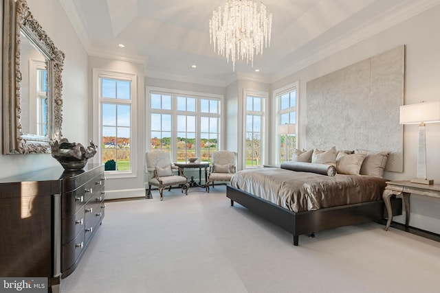 carpeted bedroom featuring ornamental molding, multiple windows, and a notable chandelier