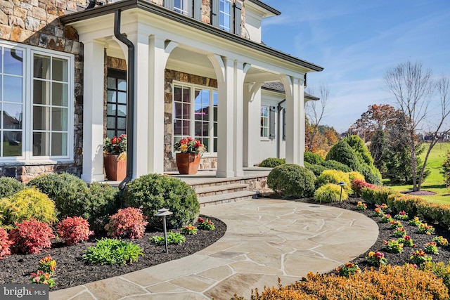 property entrance featuring covered porch