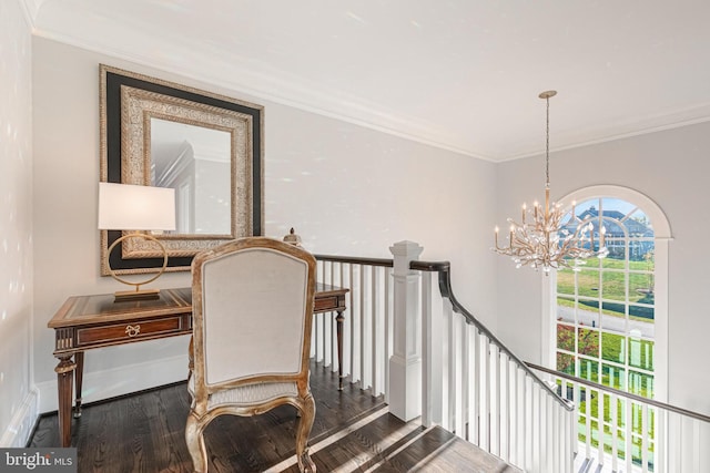 stairway with a chandelier, hardwood / wood-style flooring, and ornamental molding