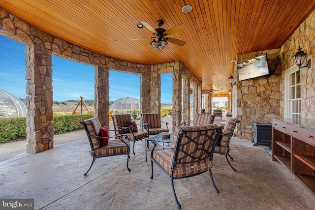 view of patio featuring an outdoor hangout area and ceiling fan