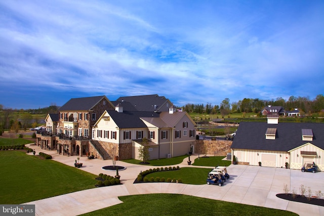 exterior space with a yard and a garage