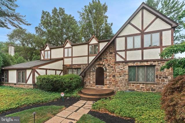 view of tudor-style house