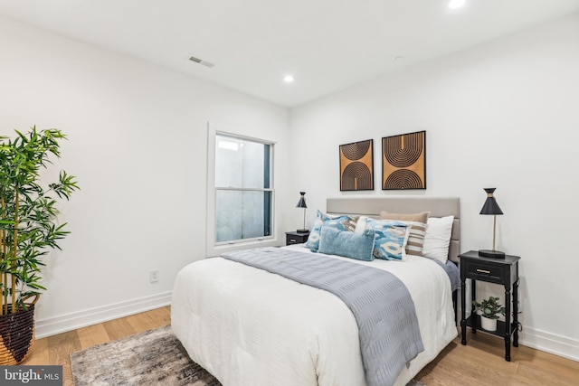 bedroom featuring wood-type flooring