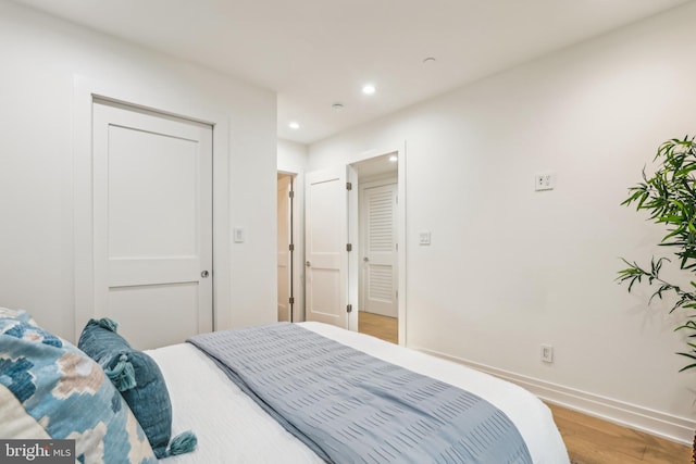 bedroom featuring hardwood / wood-style floors