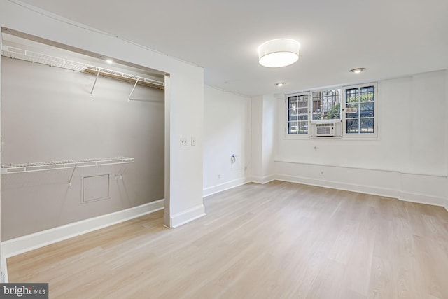 unfurnished bedroom featuring a closet and light hardwood / wood-style flooring