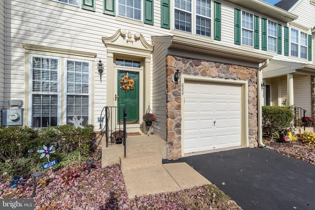 property entrance featuring a garage