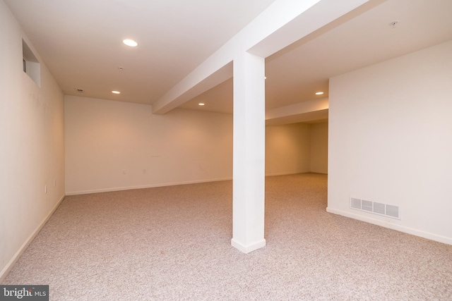 basement with light carpet