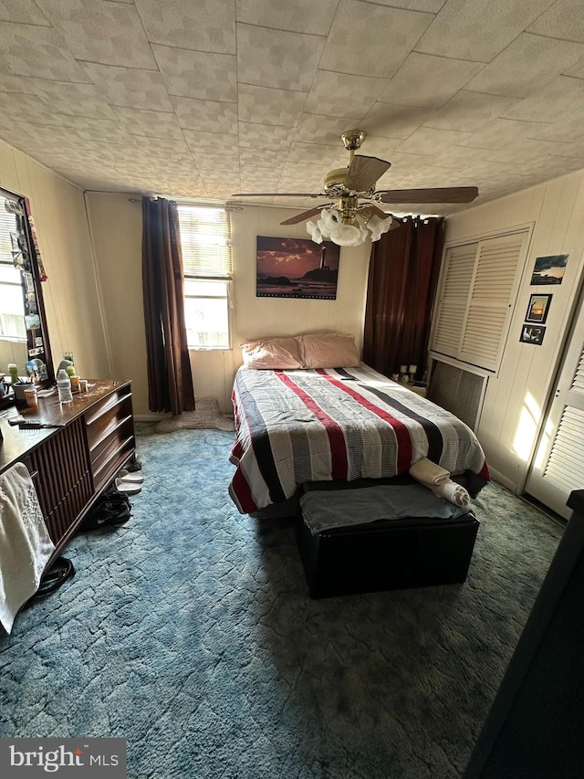 bedroom featuring carpet and ceiling fan