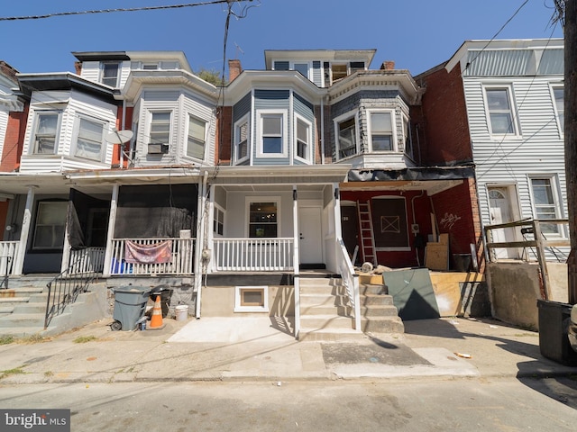 multi unit property featuring covered porch