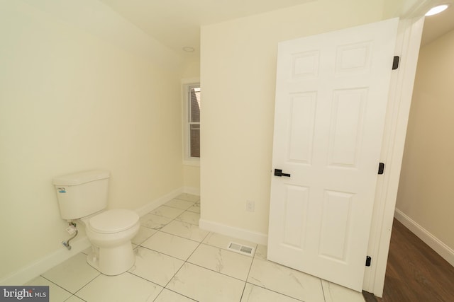 bathroom featuring toilet