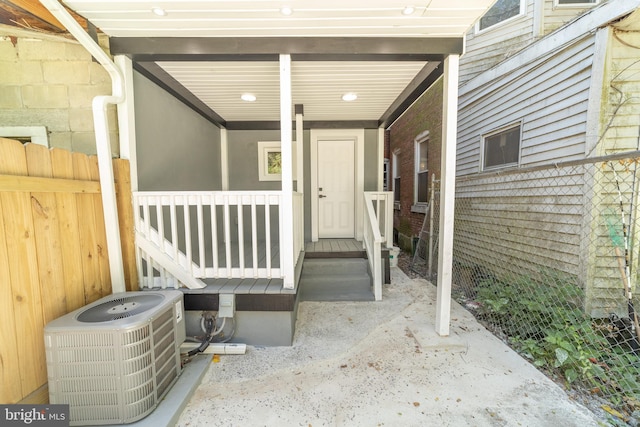 entrance to property featuring central AC