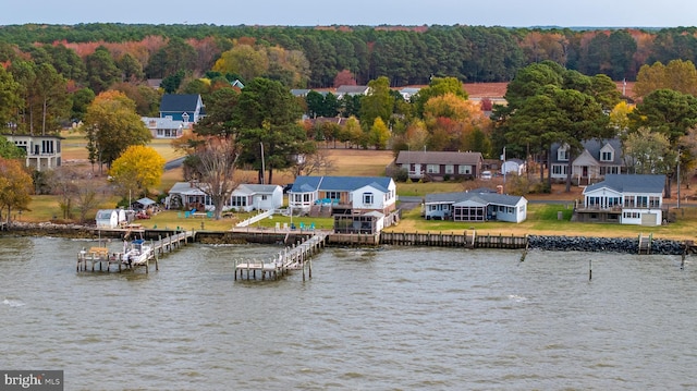 drone / aerial view featuring a water view