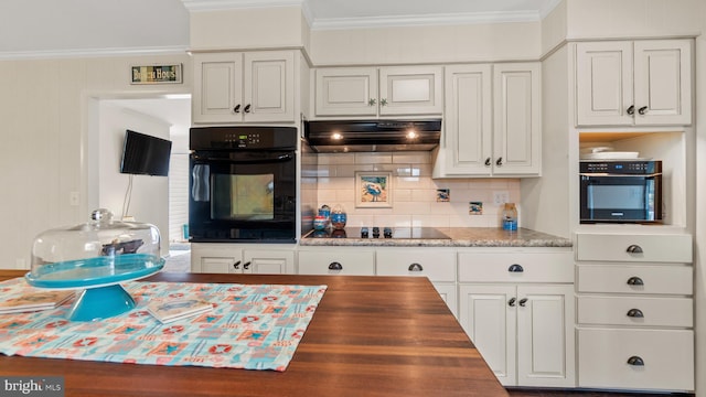 kitchen with white cabinets, crown molding, black appliances, and decorative backsplash