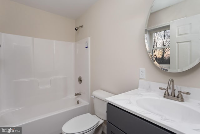 full bathroom with toilet, bathtub / shower combination, and vanity