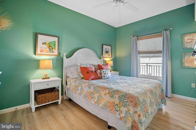 bedroom featuring ceiling fan and light hardwood / wood-style floors