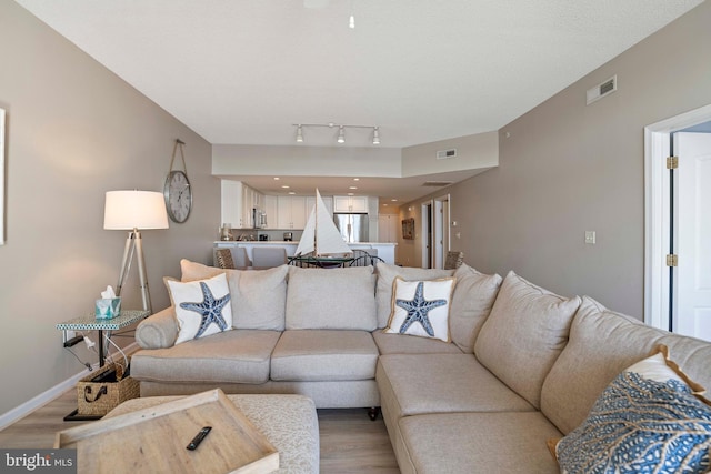 living room with light wood-type flooring