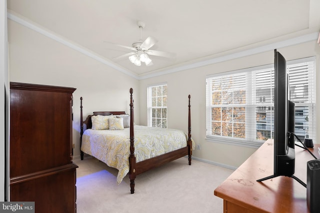 bedroom featuring light colored carpet, ceiling fan, and ornamental molding