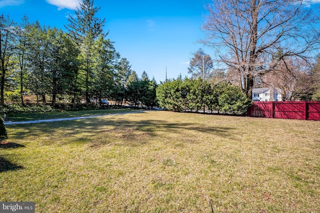 view of yard with fence