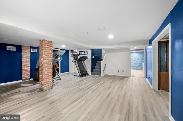 workout area featuring recessed lighting, visible vents, baseboards, and light wood finished floors