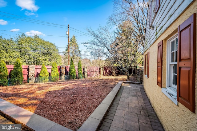 view of yard with fence