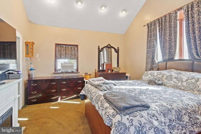 bedroom with carpet flooring and vaulted ceiling