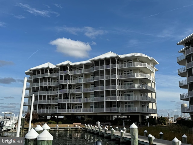 view of building exterior with a water view