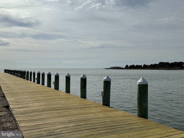 view of dock with a water view