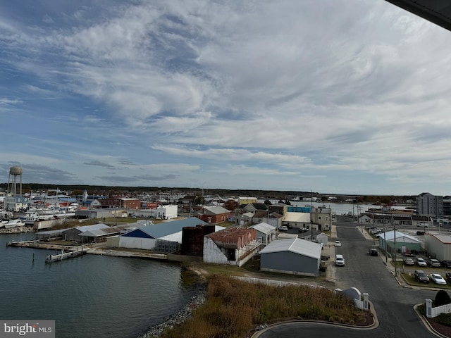 drone / aerial view with a water view