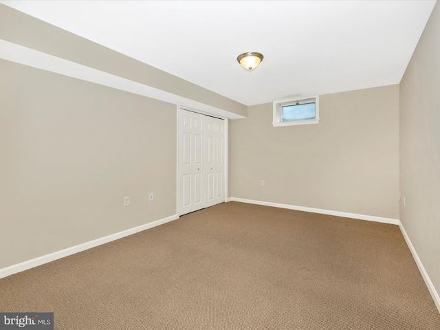 basement featuring carpet floors