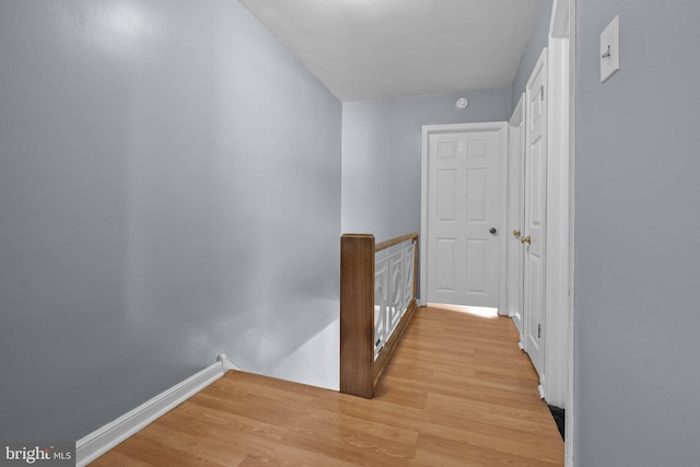 corridor featuring light wood-type flooring