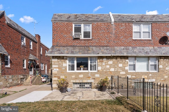 rear view of property featuring a patio area