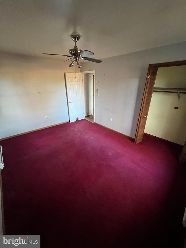 unfurnished bedroom with carpet and ceiling fan