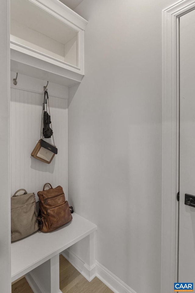 mudroom with hardwood / wood-style flooring