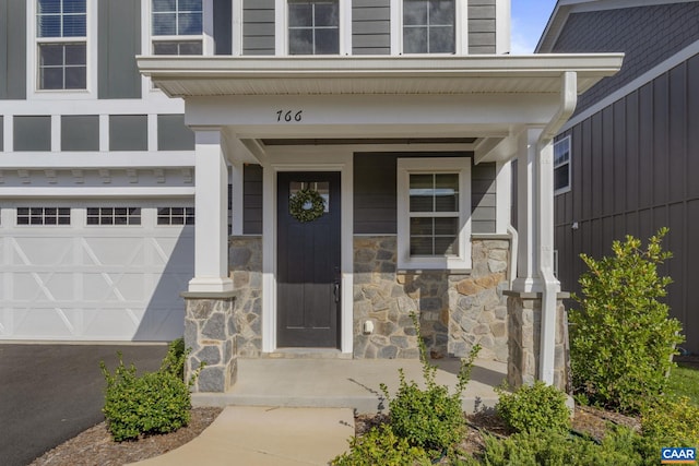 doorway to property featuring a garage