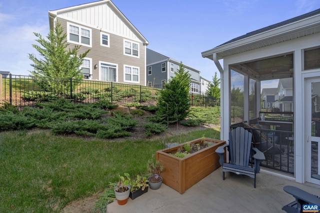 view of yard with a sunroom