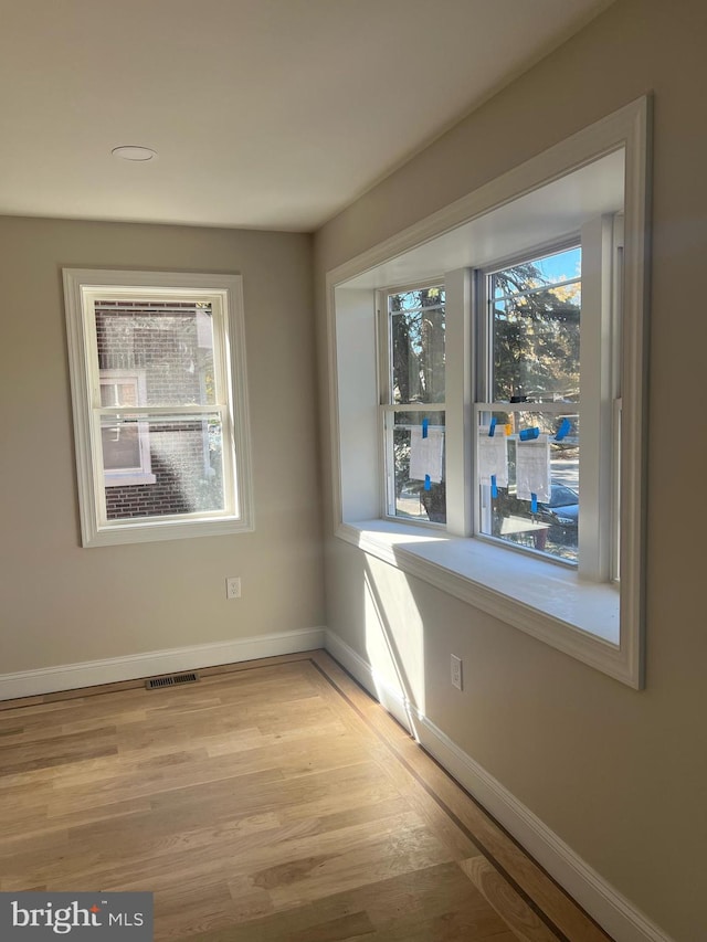 empty room featuring light hardwood / wood-style flooring