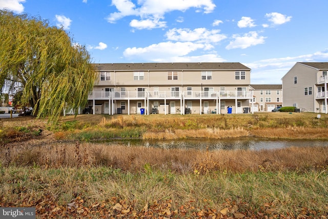 view of building exterior featuring a water view