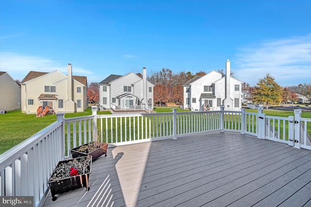 deck featuring a lawn