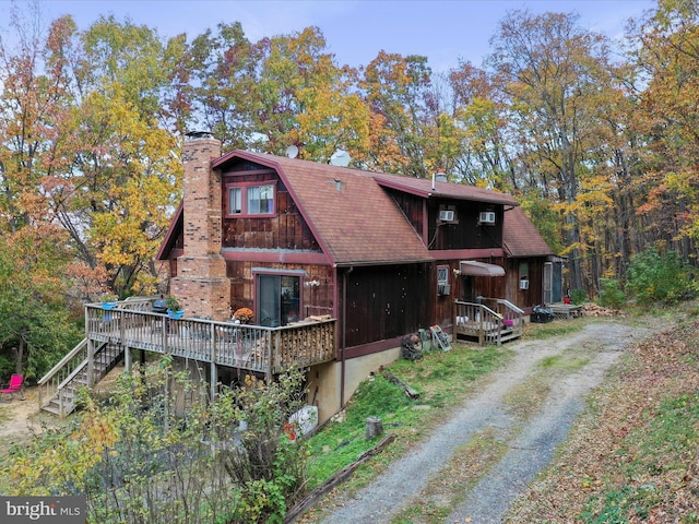 831 Stephens Ln, Fort Valley, VA 22652 - view of front of home featuring a chimney, a deck, and a shingled roof