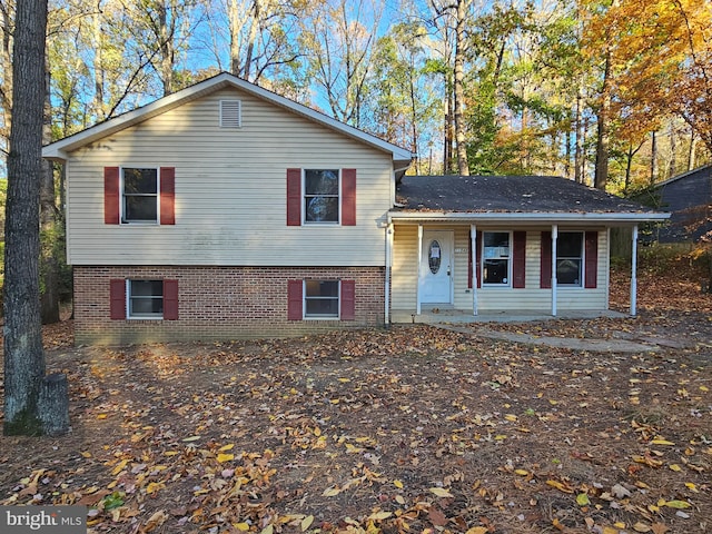 tri-level home featuring a porch