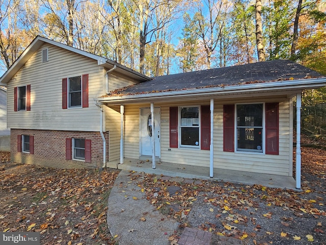 tri-level home with a porch