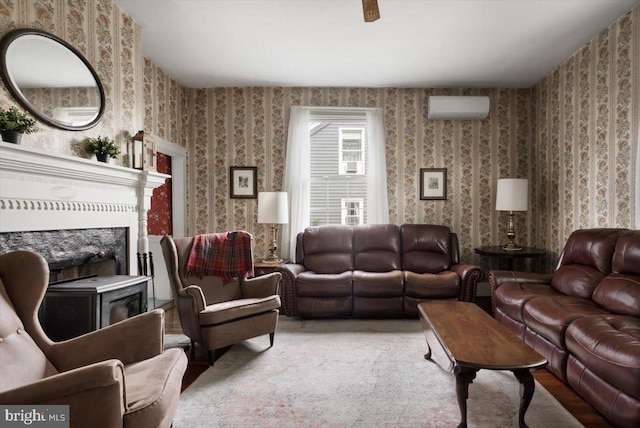 355 Orchard Dr, Mount Jackson, VA 22842 - living room featuring an AC wall unit, wallpapered walls, and a fireplace