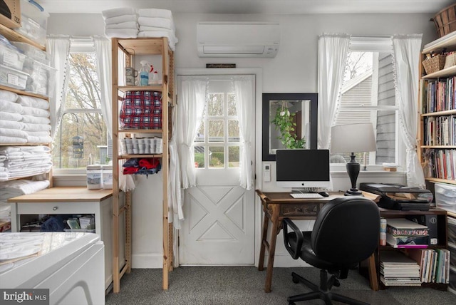 office area with carpet flooring, plenty of natural light, and a wall unit AC