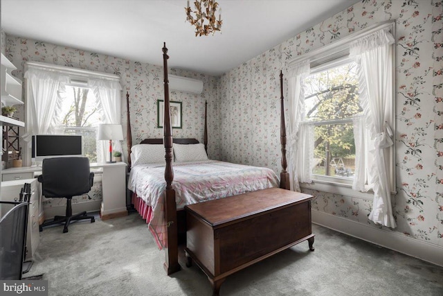 bedroom with multiple windows, carpet floors, and a wall mounted air conditioner