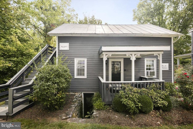 view of front of home featuring covered porch