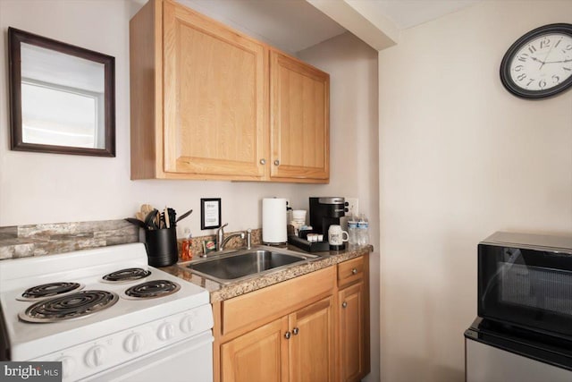 kitchen with sink, light brown cabinets, and white electric stove