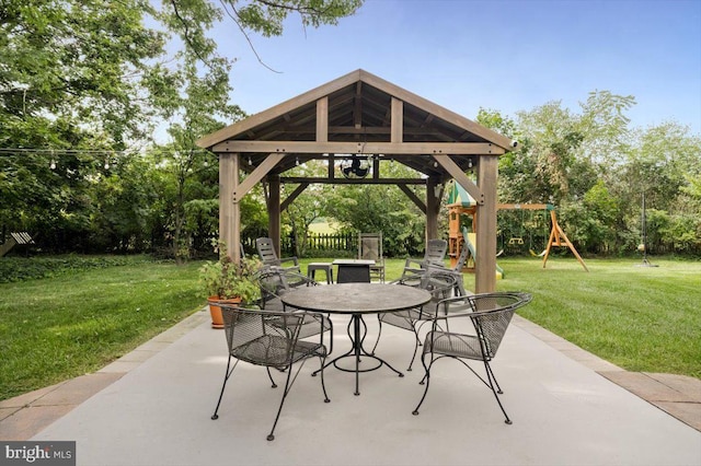 355 Orchard Dr, Mount Jackson, VA 22842 - view of patio / terrace featuring a playground, a gazebo, outdoor dining space, and view of wooded area